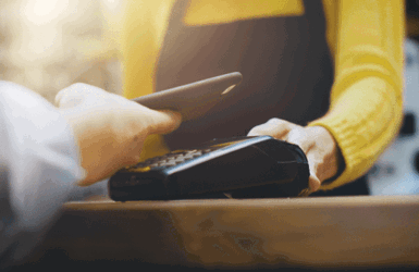 Customer making a contactless payment