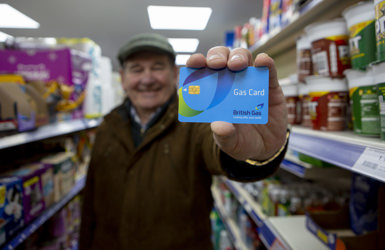 A customer holding a British Gas Card